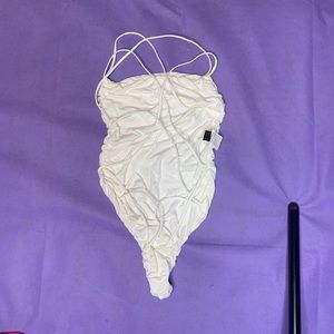 Small white lace bodysuit